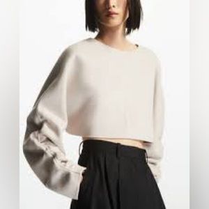 Cos bolero jacket with back fastening